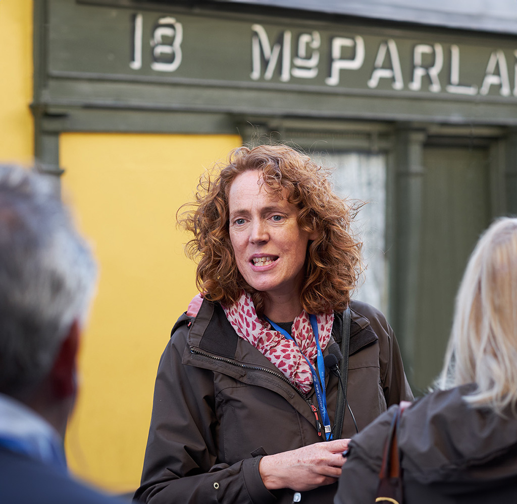 Jane medium shot in front of McParland