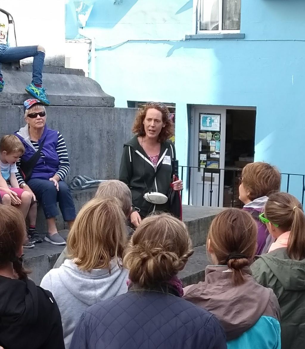 Jane at O-Connell monument with large tour group